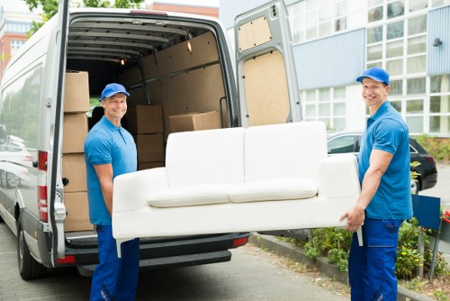 House removalists loading furniture for a local move in Removalcompany