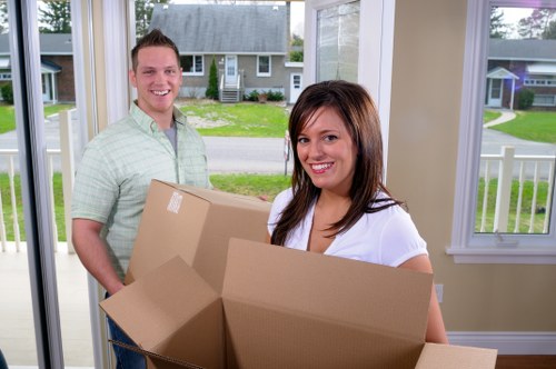 Furniture and boxes prepared for a house relocation service