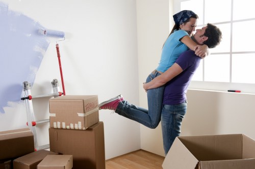 Man and van removals team organizing items before transport