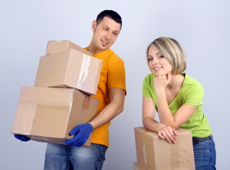 Commercial relocation loading furniture and equipment into a truck