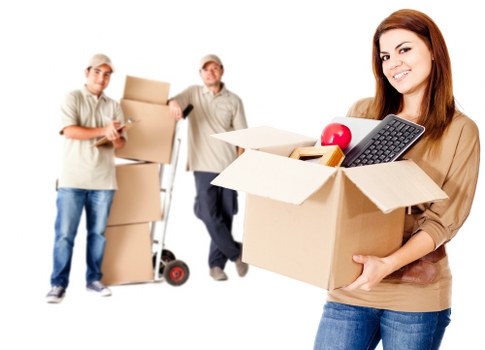 Packed boxes and furniture ready for a local man and van removal