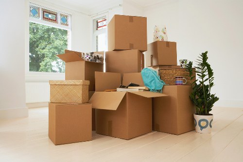 Man and van removals service transporting furniture through a city street